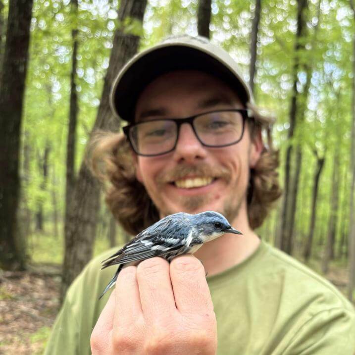 Tyler holding a bird