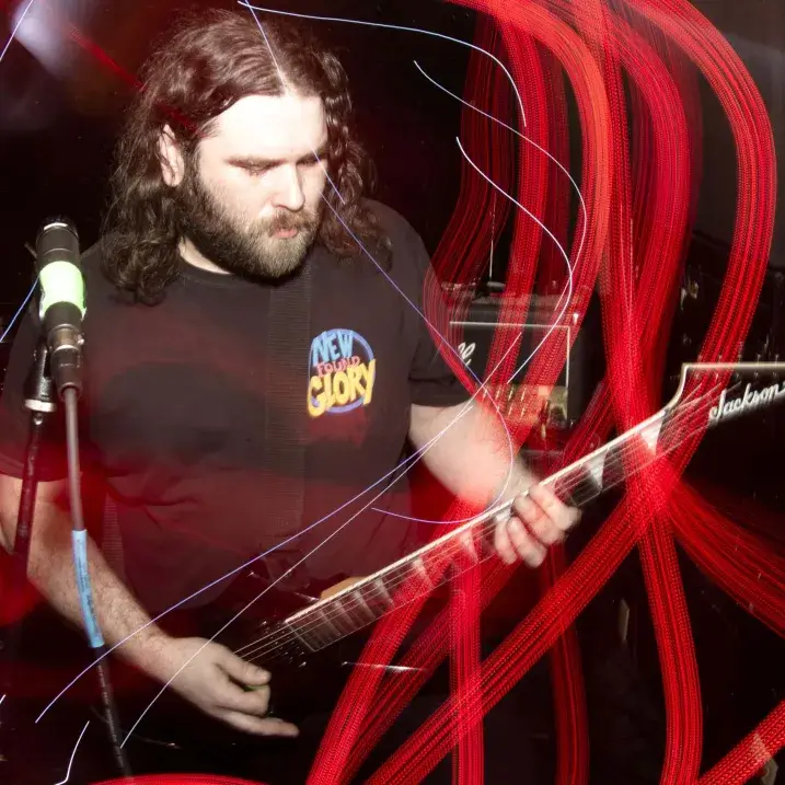 A person playing guitar