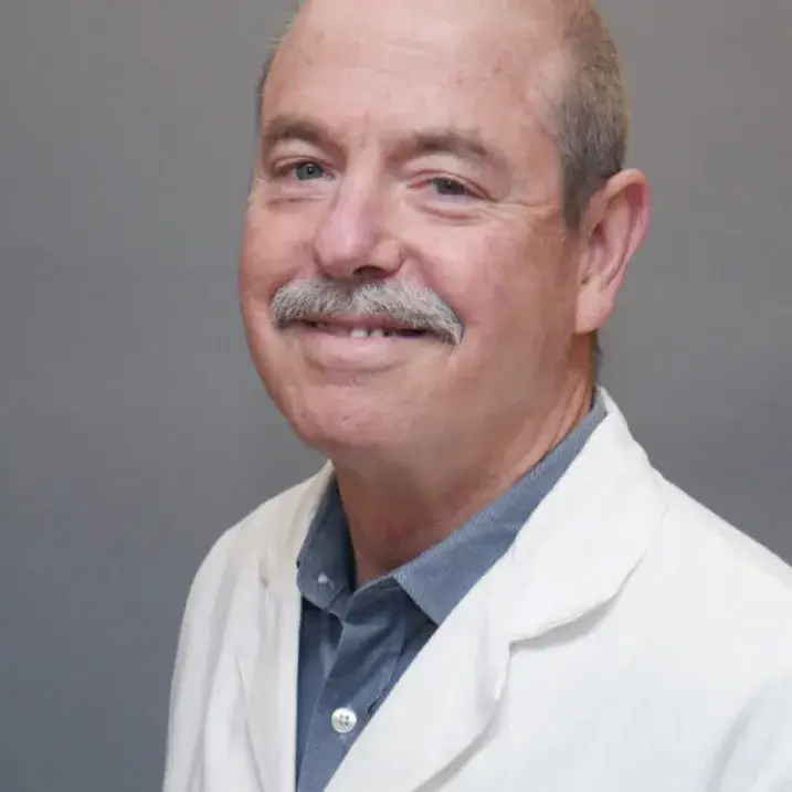 Man in white coat