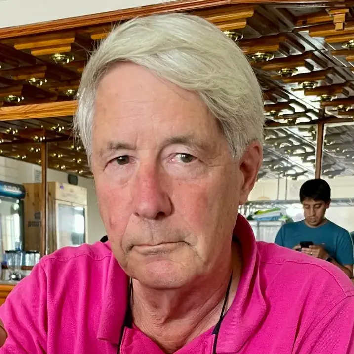 Jim in a hot-pink shirt