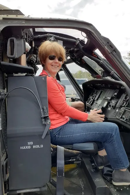 Celia Rainville sitting in an airplane cockpit