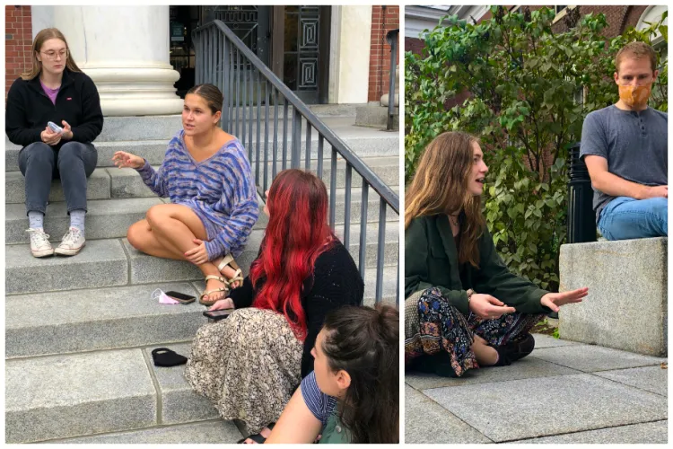 Students talking on the front steps of Waterman building.