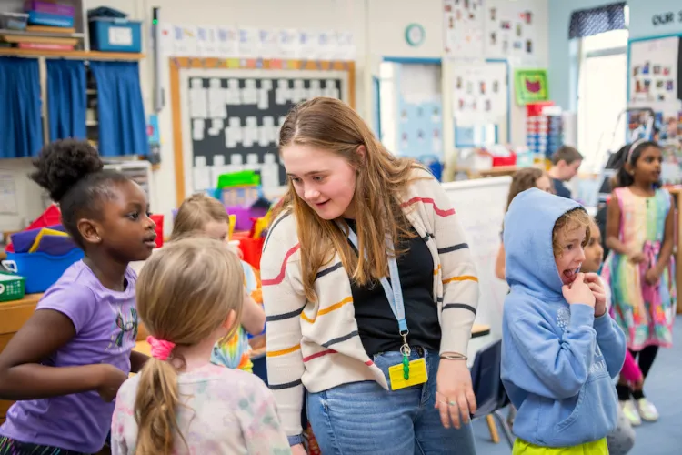 Sarah Bassett with students at Orchard Elementary School