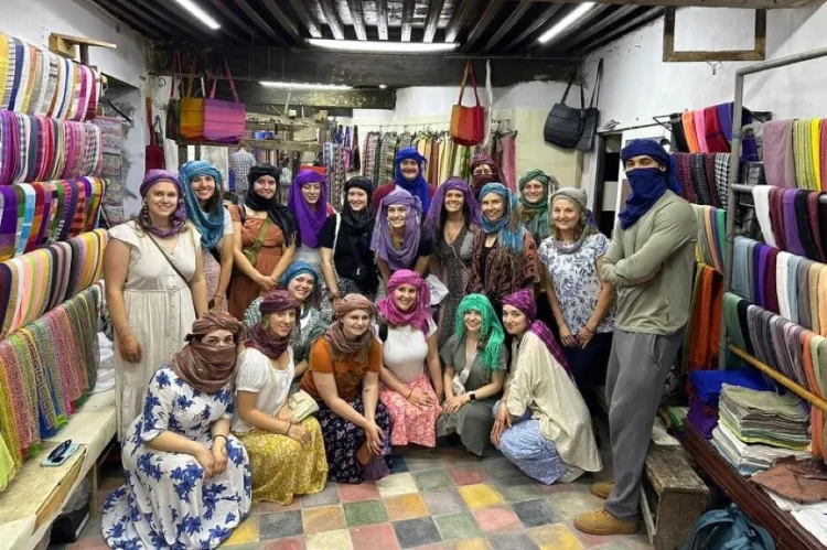 UVM OT students visit a textile shop in Morocco