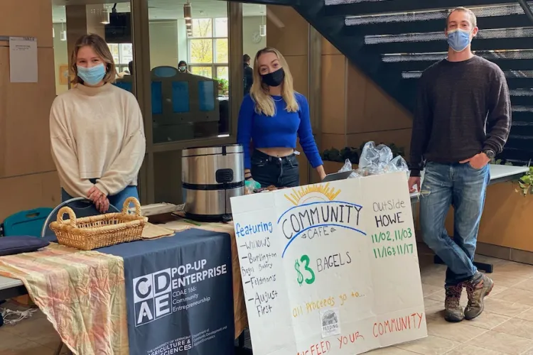 students selling bagels