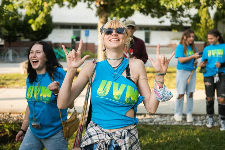 Energetic student gestures with hands.