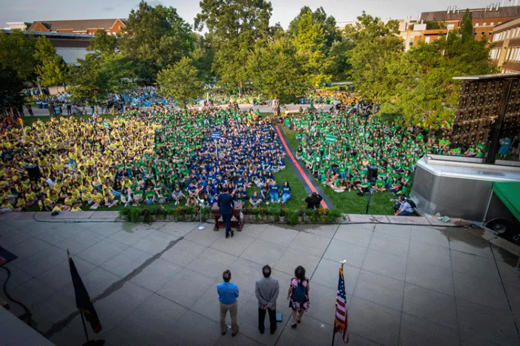 Students gather by Learning Community on the Green for Convocation.