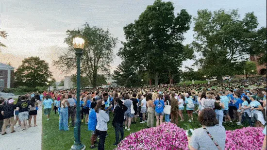 Panoramic perspective of the Green filled with students.