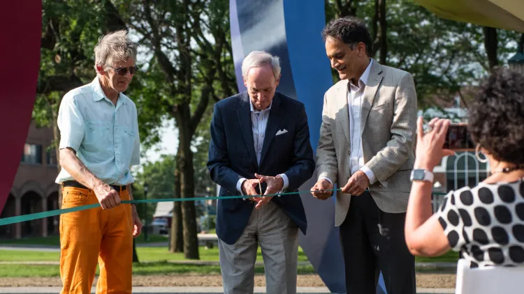David Strotmeyer, Thomas Sullivan, and Suresh Garimella cutting a dedication ribbon