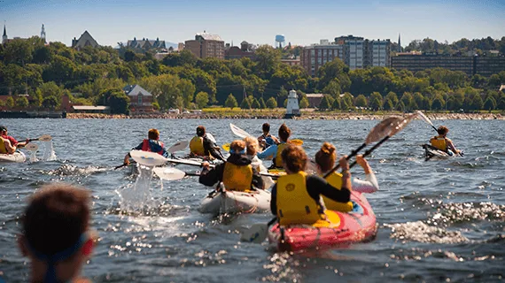 Kayakers in the lake facing Burlington