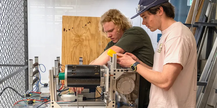 Senior electrical engineering students at work on their capstone project