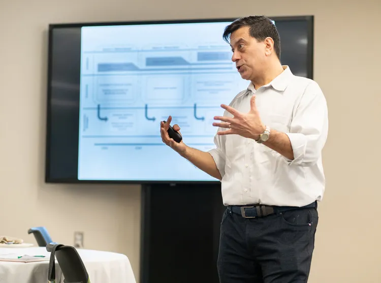 Michael Loundsbury answers a question as the GSB Research Series Seminar speaker
