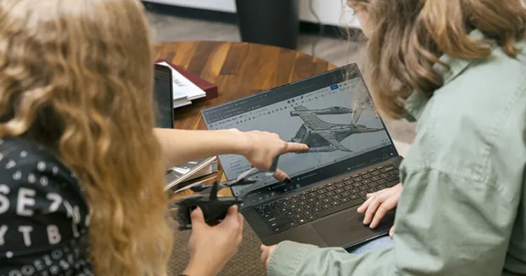 CEMs student collaborate on rendering a digital design project