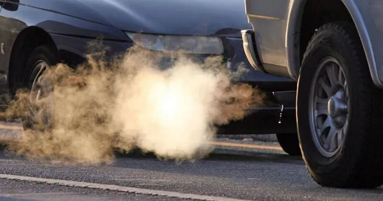 Image of car with exhaust cloud