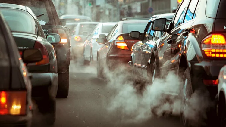 Car traffic with heavy exhaust