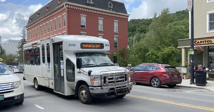 Small transit bus traveling in rural Vermont