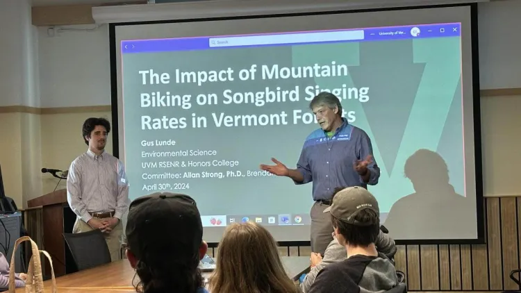 Allan Strong speaking to the crowd at Gus Lunde's thesis defense