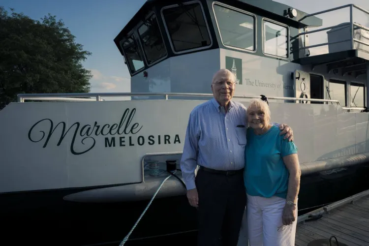 Patrick Leahy and Marcelle Leahy in front of the research vessel