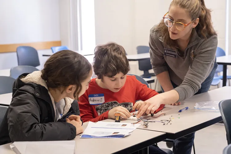 Students participate in a circuit building workshop