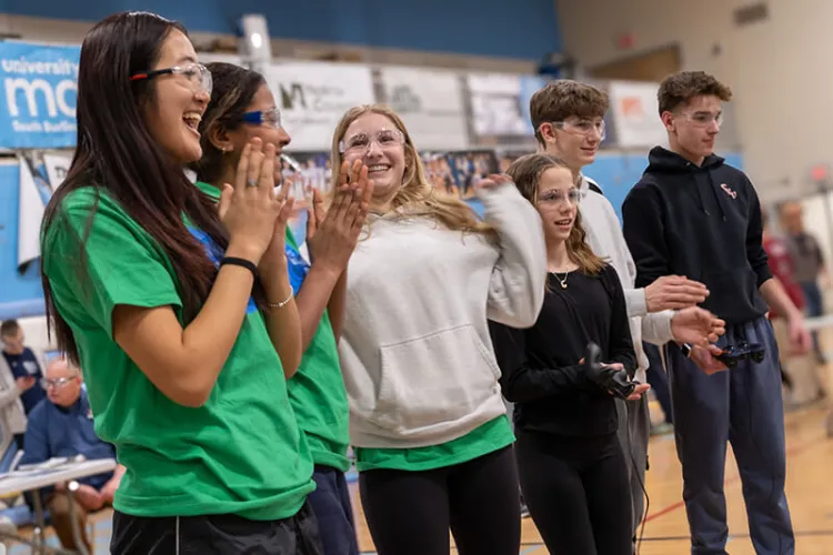 Students celebrate at the end of a match during the 2025 FTC State Championship