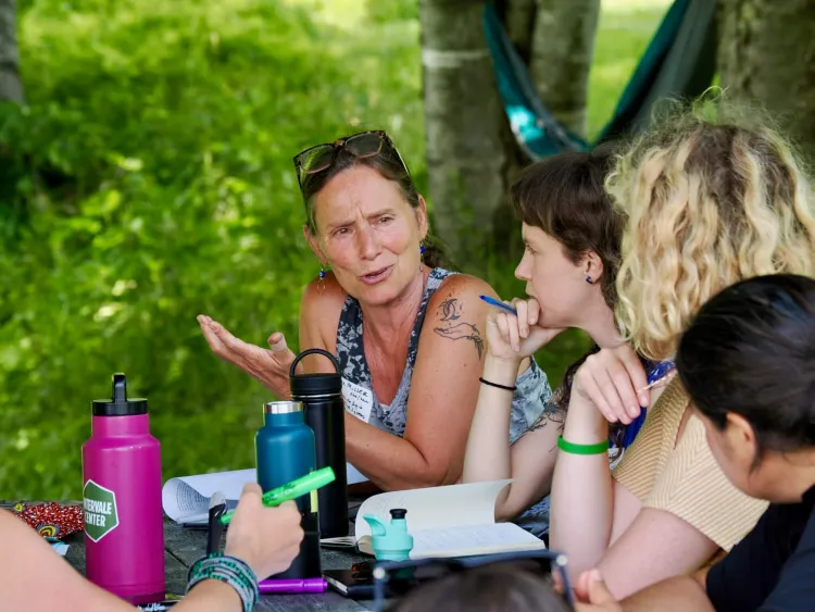 Fran Miller, senior staff attorney and adjunct faculty member at the Center for Agriculture and Food Systems (CAFS) at Vermont Law School (VLS), speaks with Katie Horner (center), Postdoctoral Associate at the UVM Institute for Agroecology.