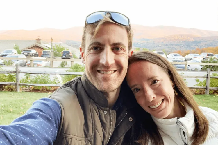 a man and a woman smiling