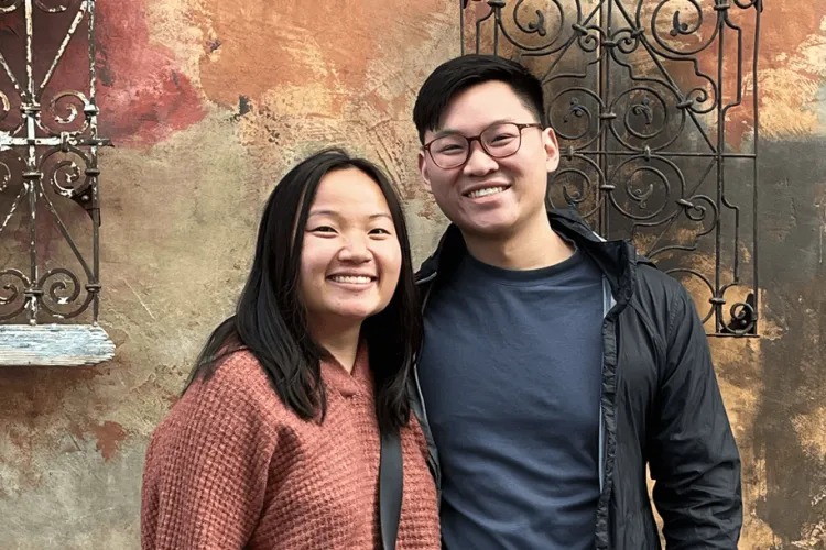 a woman and a man smiling