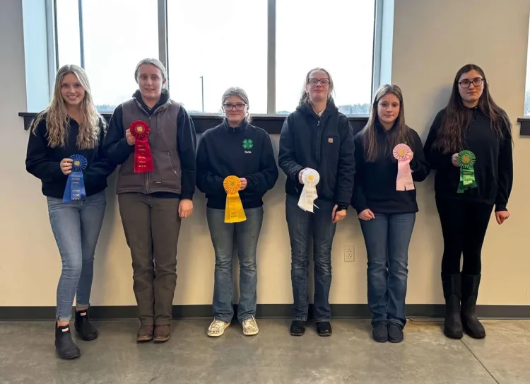 6 kids with prize ribbons