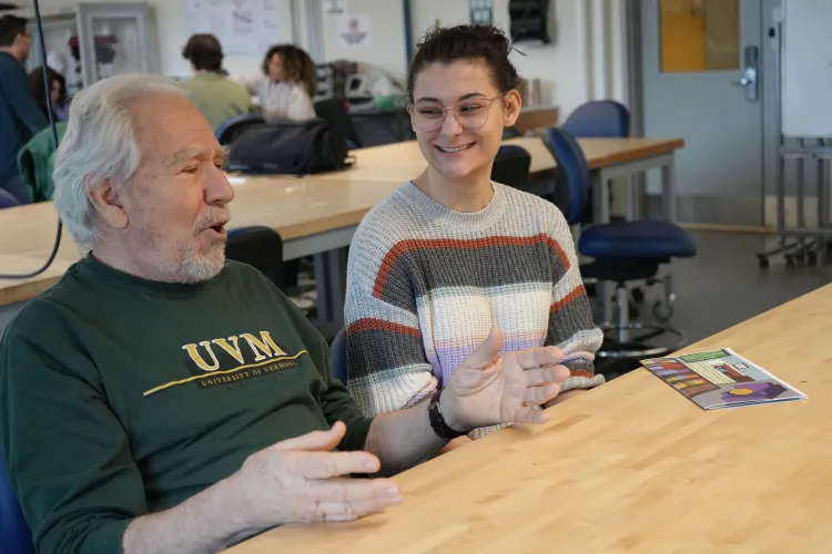 UVM professor and student discussing this project