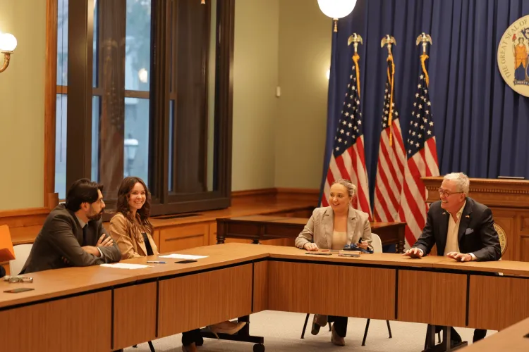 New Jersey Statehouse Reporting Collaborative fall 2025 interns interviewing Gov. Phil Murphy (his press secretary Natalie Hamilton is on his left. The students are Gary Love and Lila Swietask.)