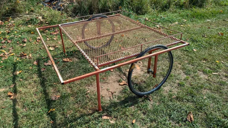 a spray table on wheels outdoors