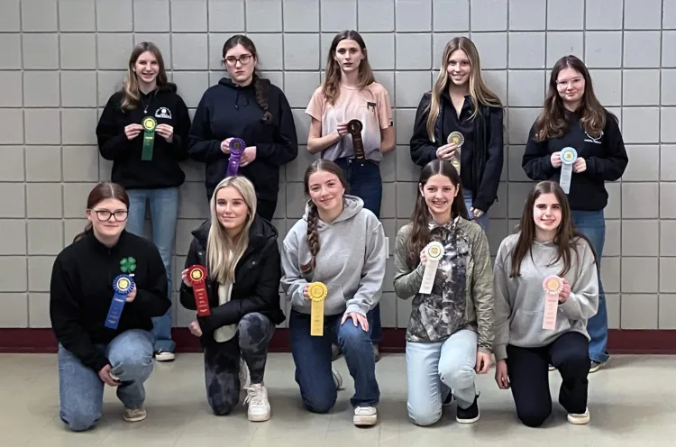group of 4-h'ers holding ribbons