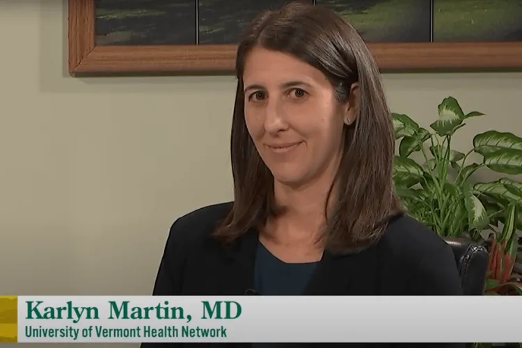 a woman being at a TV program set