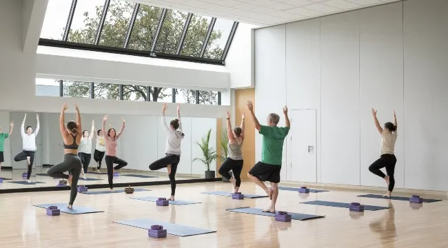 A group yoga class at UVM