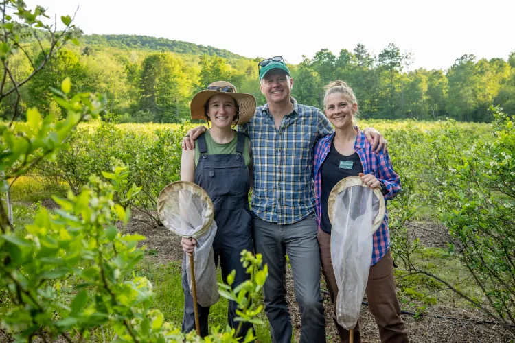 Leslie Spencer working with farmers in Vermont