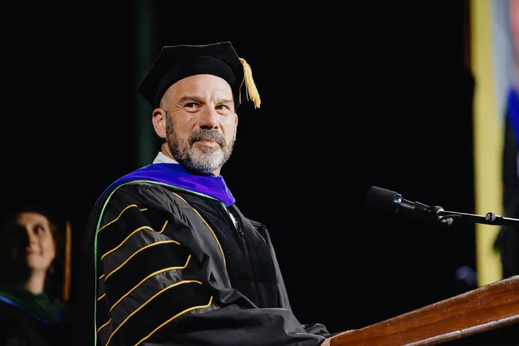 Peter Newman speaking during commencement