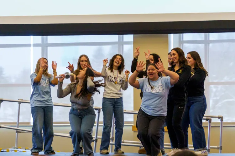 A group of sorority members dance at RALLYTHON, one of UVM's signature philanthropic events.