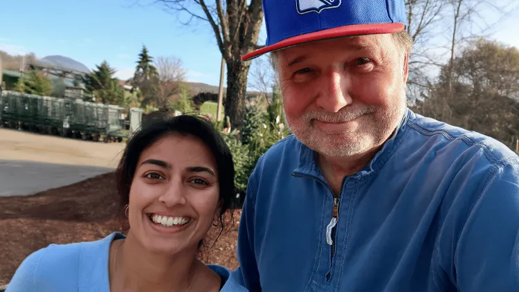 a woman and a man smiling