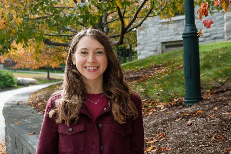 a woman posing outdoors