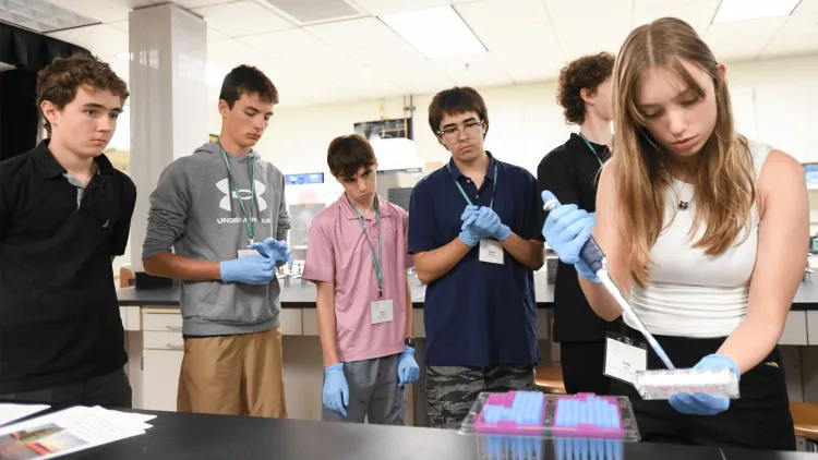 high schoolers in a science lab