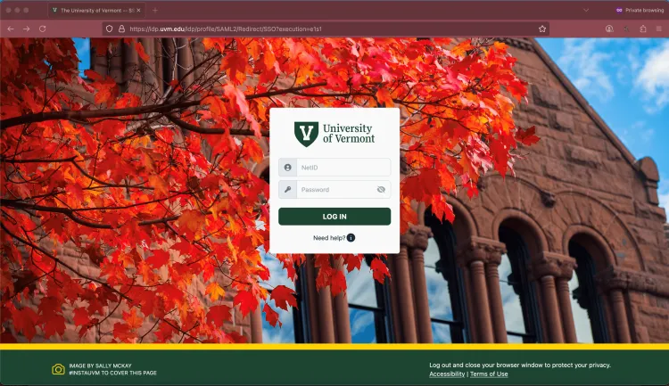 The UVM single sign-on page, with the username and password prompt superimposed on a detail of Billings Hall with an orange tree in front of it