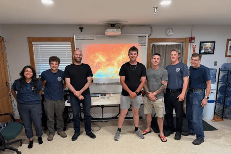 a group of people at a fire station