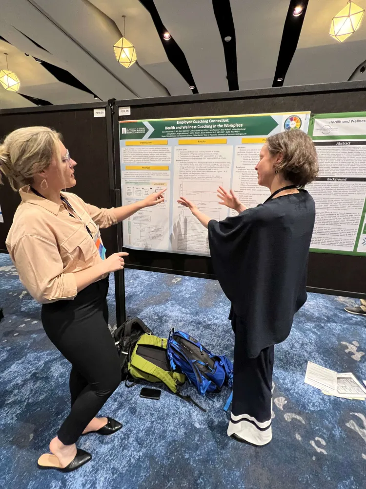 Whitman (Right), discusses how Health & Wellness Coaching is transforming workplace health with Alyssa Smith, PhD.