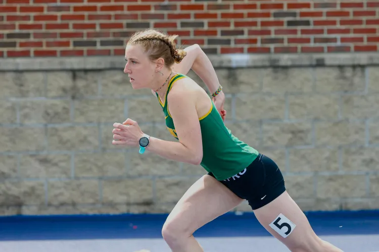 Cat Mawn running in a track meet.