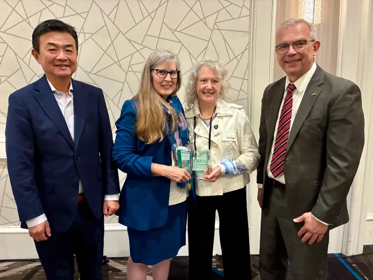 CAEP Board Chair Yuhang Rong CESS Director of Assessment, Data, and Accreditation Stephanie Ratmeyer, CESS Associate Dean Kelly Clark/Keefe, and CAEP President Christopher Koch