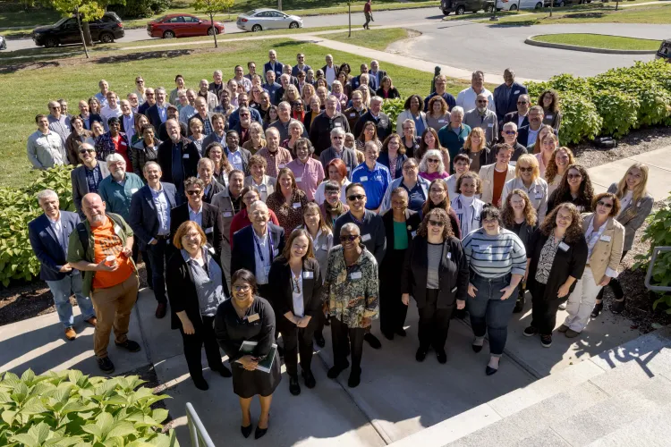 Conference attendees on the Alumni House lawn