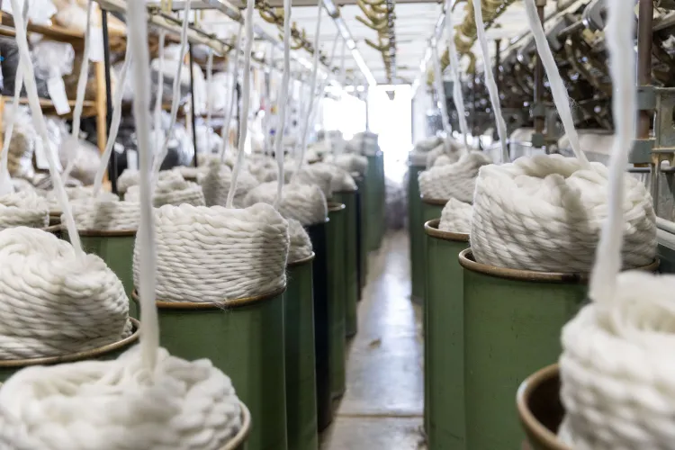Spinning spools of yarn