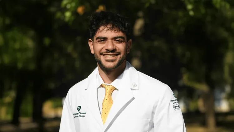 a person in a white coat outside