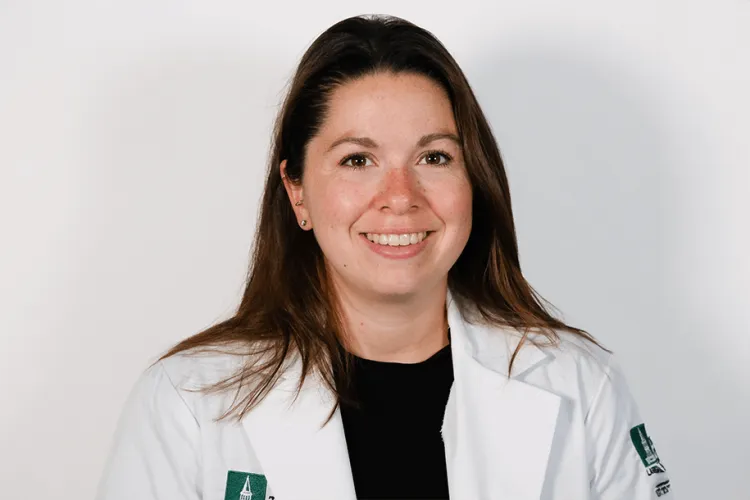 a person in a white coat