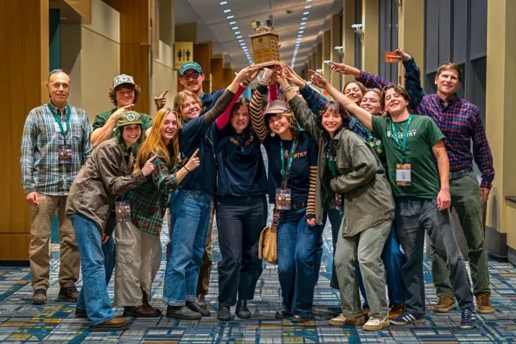 The whole UVM Forestry crew at the SAF Convention holding up the quiz bowl trophy, photo courtesy of SAF taken by Wasim Muklashy